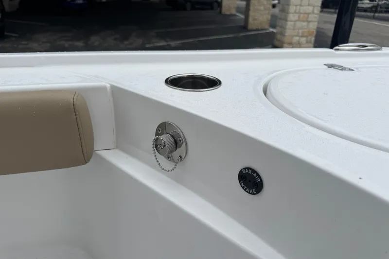 Slide: The Image of 2026 Blazer Bay 2440 boat interior with air intake and cup holder. - 46