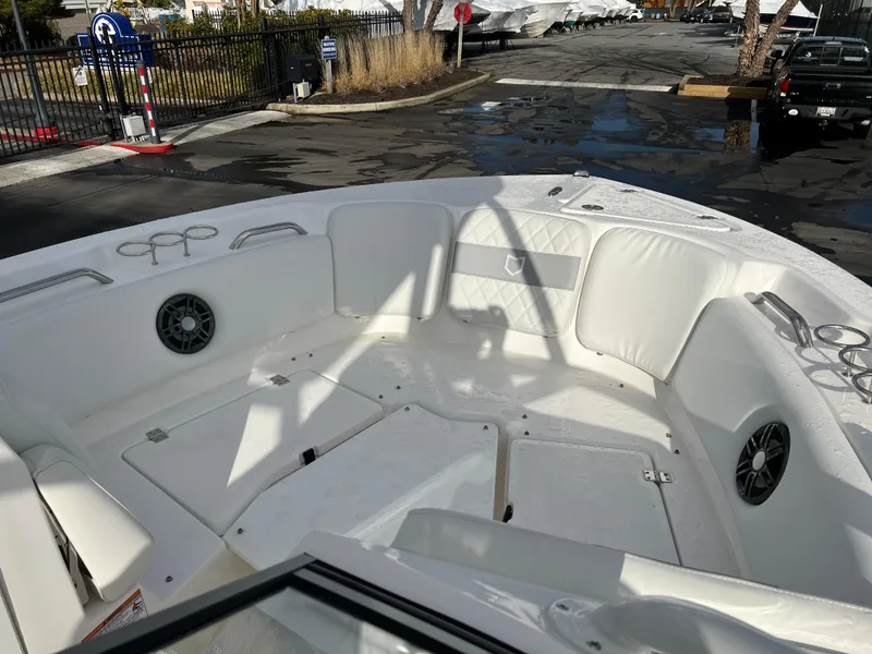 Slide: The Image of 2024 Sea Fox 228 Traveler boat interior with seating and storage compartments. - 17