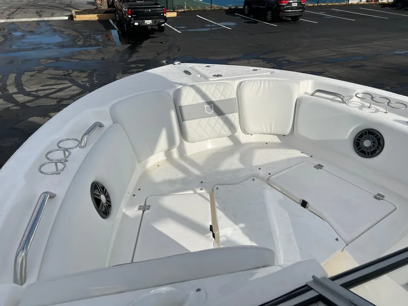 Slide: The Image of 2024 Sea Fox 228 Traveler boat interior with seating and cup holders. - 18