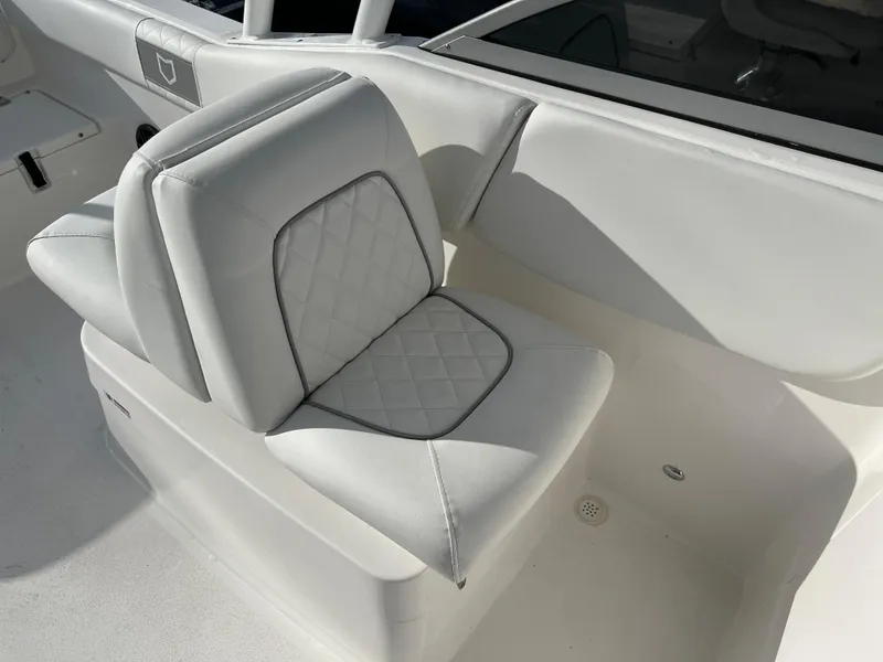 Slide: The Image of 2024 Sea Fox 228 Traveler boat seat with diamond-stitched upholstery. - 21