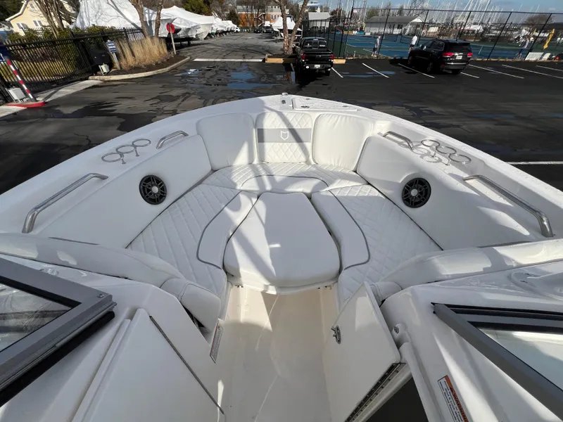 Slide: The Image of 2024 Sea Fox 228 Traveler boat interior with white cushioned seating. - 26