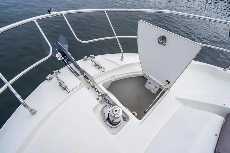Slide: The Image of Bow of 2018 Prestige 520S yacht with anchor and open hatch. - 23