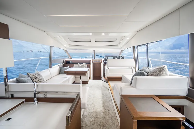 Slide: The Image of Luxurious interior of 2018 Prestige 520S yacht with elegant white seating and ocean view. - 33