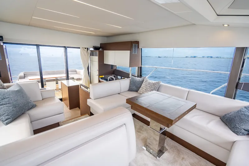 Slide: The Image of Luxurious interior of 2018 Prestige 520S yacht with ocean view and modern furnishings. - 35