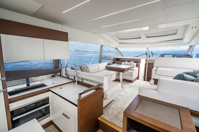 Slide: The Image of Luxurious interior of 2018 Prestige 520S yacht with modern kitchen and seating area. - 38