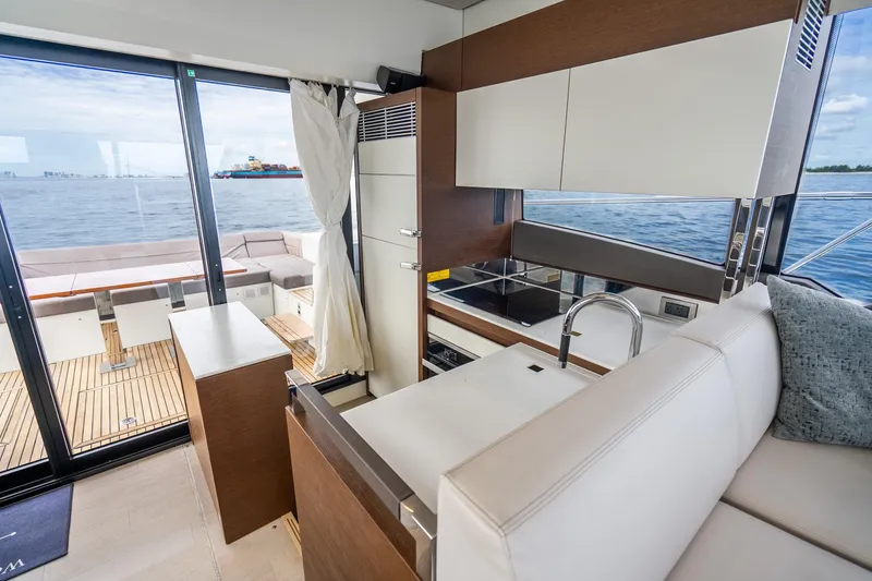 Slide: The Image of Luxurious interior of 2018 Prestige 520S yacht with modern kitchen and ocean view. - 39