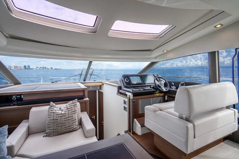 Slide: The Image of Luxurious interior of 2018 Prestige 520S yacht with ocean view and modern helm. - 41
