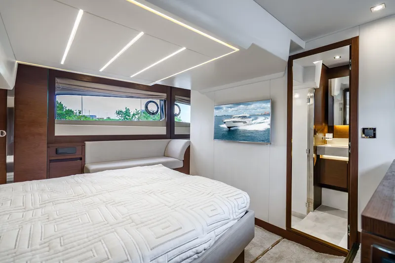 Slide: The Image of Luxurious interior of 2018 Prestige 520S yacht with modern bedroom and ensuite bathroom. - 49