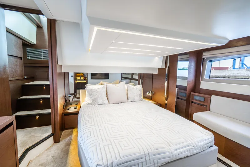 Slide: The Image of Luxurious bedroom interior of 2018 Prestige 520S yacht with modern design and elegant furnishings. - 50