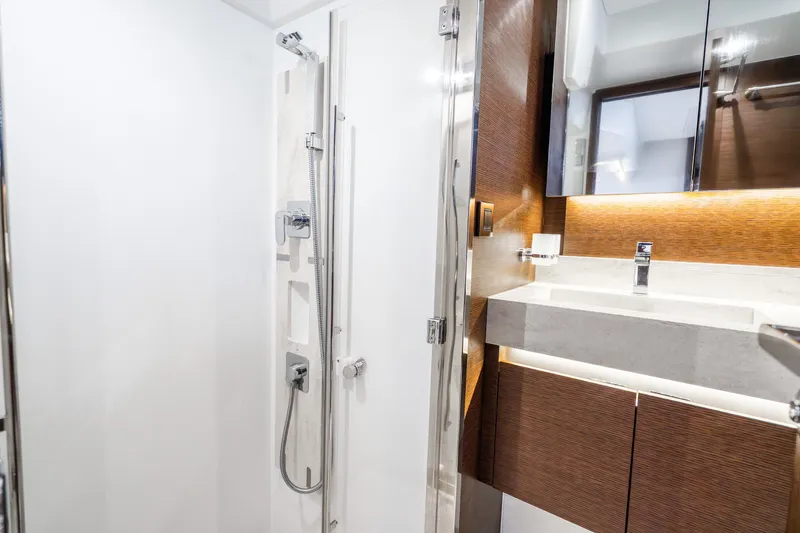 Slide: The Image of Luxurious bathroom in 2018 Prestige 520S yacht with modern shower and sleek vanity. - 56
