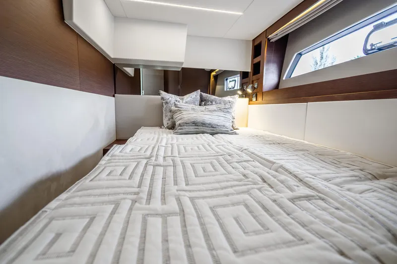 Slide: The Image of Luxurious cabin interior of 2018 Prestige 520S yacht with elegant bedding and modern design. - 58