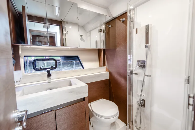 Slide: The Image of Luxurious bathroom in 2018 Prestige 520S yacht with modern fixtures and elegant design. - 59