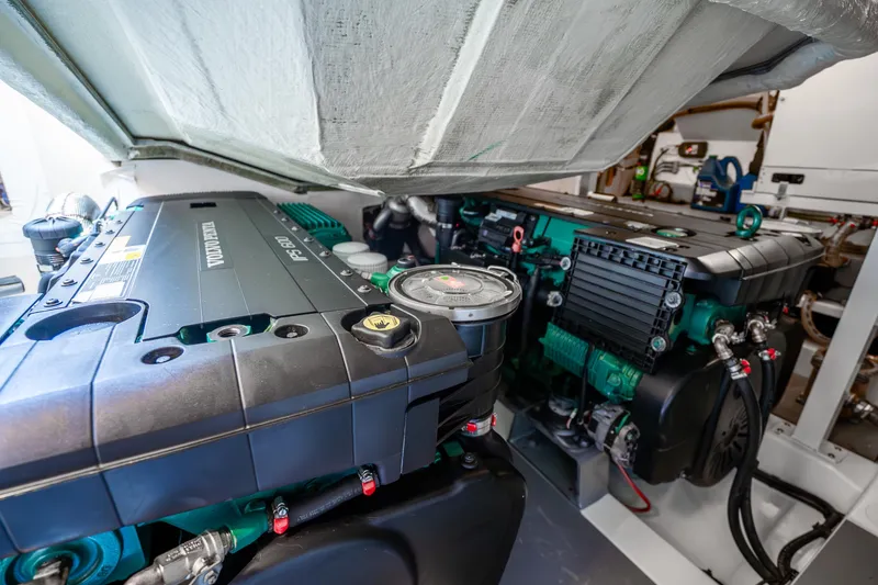 Slide: The Image of Engine room of a 2018 Prestige 520S yacht, featuring Volvo Penta engines. - 62