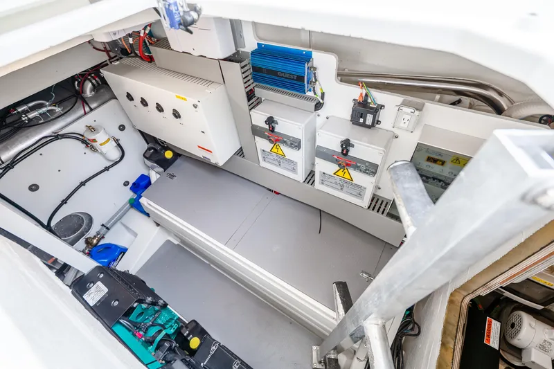 Slide: The Image of Engine room of 2018 Prestige 520S yacht with electrical systems and components. - 63