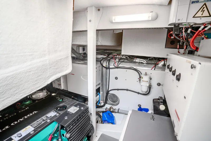 Slide: The Image of Engine room of 2018 Prestige 520S yacht with Volvo Penta components and electrical systems. - 65