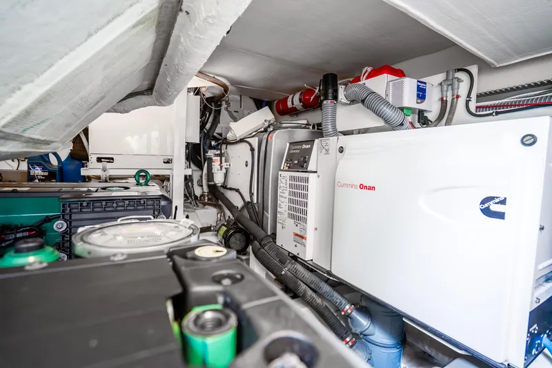 Slide: The Image of Engine room of 2018 Prestige 520S yacht with Cummins Onan generator and equipment. - 66