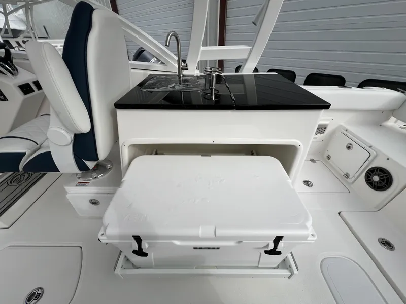 Slide: The Image of 2024 Sea Fox 268 Traveler boat interior with sink and storage compartment. - 18