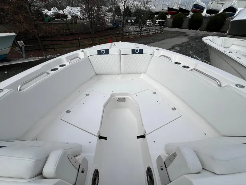 Slide: The Image of 2024 Sea Fox 268 Traveler boat interior with spacious seating and storage. - 6
