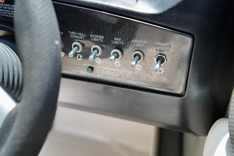 Slide: The Image of Control panel of a 2008 Sea Ray 230 Select Fission boat. - 23