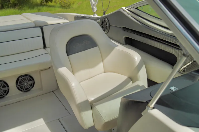 Slide: The Image of 2008 Sea Ray 230 Select Fission boat interior with white leather seating. - 24