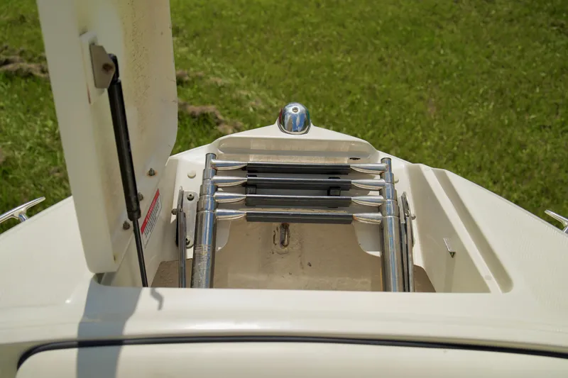 Slide: The Image of 2008 Sea Ray 230 Select Fission boat with a folded swim ladder. - 6