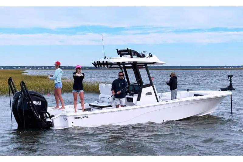 The Image of Manufacturer Provided Image: 2025 Sea Fox 282 Hybrid LT boat on water with people fishing. - 0