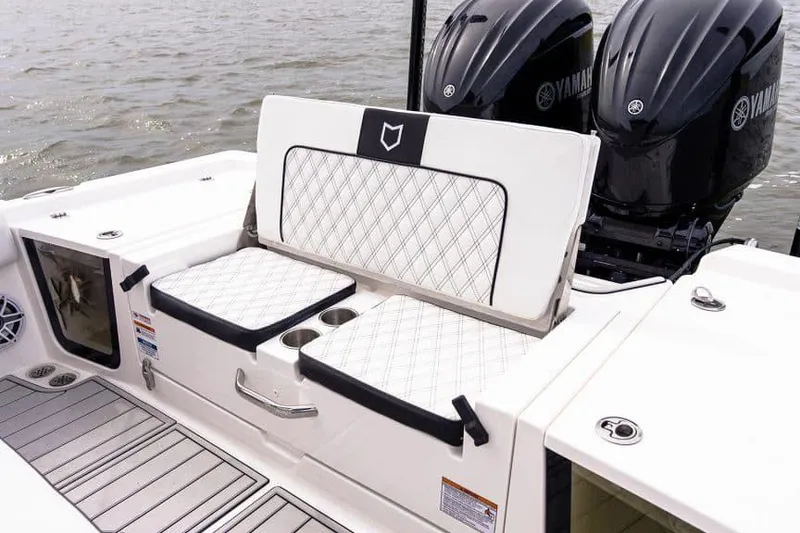 Slide: The Image of Manufacturer Provided Image: 2025 Sea Fox 282 Hybrid LT boat with Yamaha engines, featuring cushioned seating and sleek design. - 9