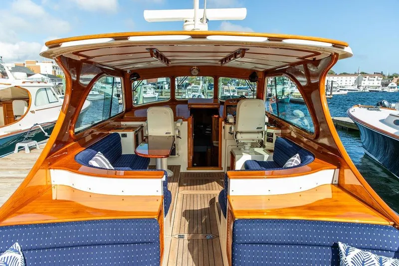 Slide: The Image of Interior view of a 2005 Hinckley Talaria 40 yacht with elegant wood finish. - 7