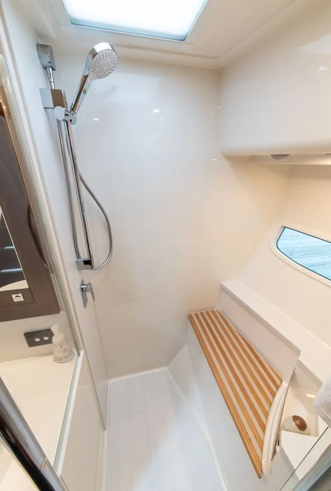 Slide: The Image of Luxurious shower area in 2022 Riviera 6000 Sport Yacht Platinum. - 45