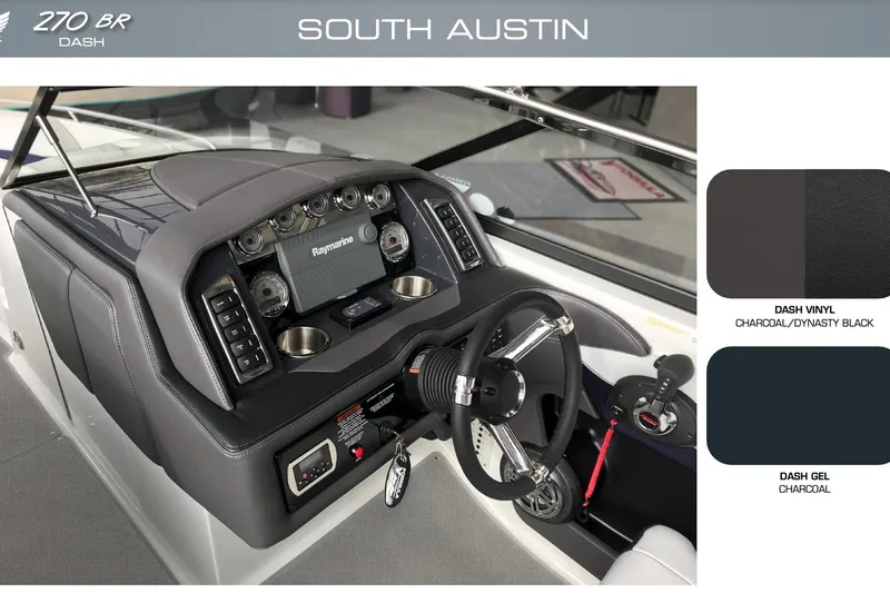 Slide: The Image of 2026 Formula 270 Bowrider dashboard with Raymarine display, charcoal and dynasty black vinyl. - 2