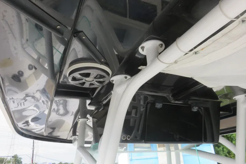 Slide: The Image of 2020 Cape Horn 31 T boat with trolling motor, parked near trucks and other boats. - 20