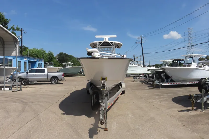 Slide: The Image of 2020 Cape Horn 31 T boat on trailer, featuring Suzuki outboard motor. - 3
