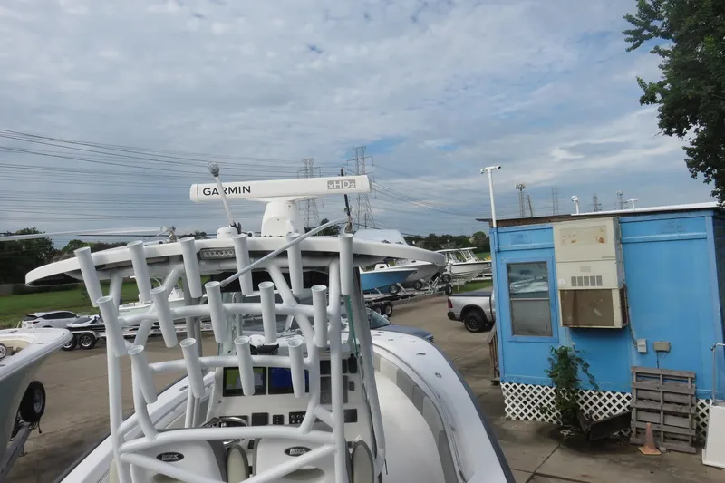 Slide: The Image of 2020 Cape Horn 31 T boat with T-top and seating, docked at marina. - 9