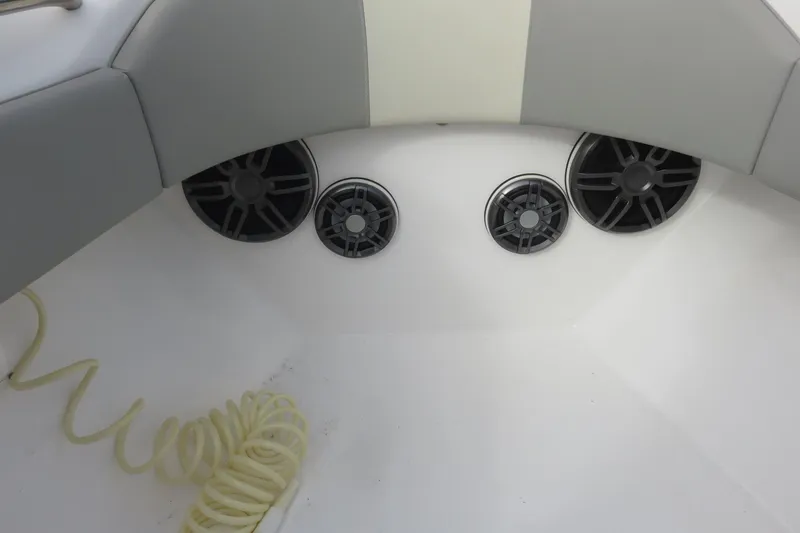 Slide: The Image of 2020 Cape Horn 31 T boat dashboard with steering wheel and controls. - 16