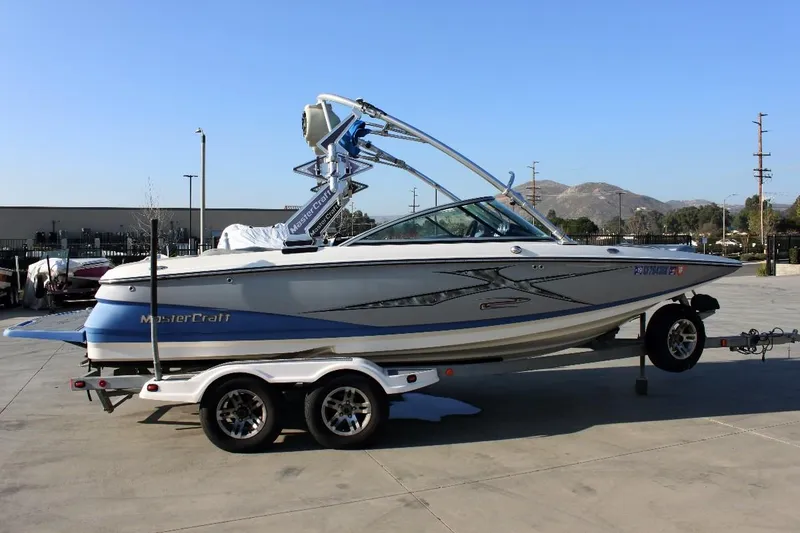 Slide: The Image of 2007 MasterCraft X-2 SS boat on trailer in outdoor setting. - 2