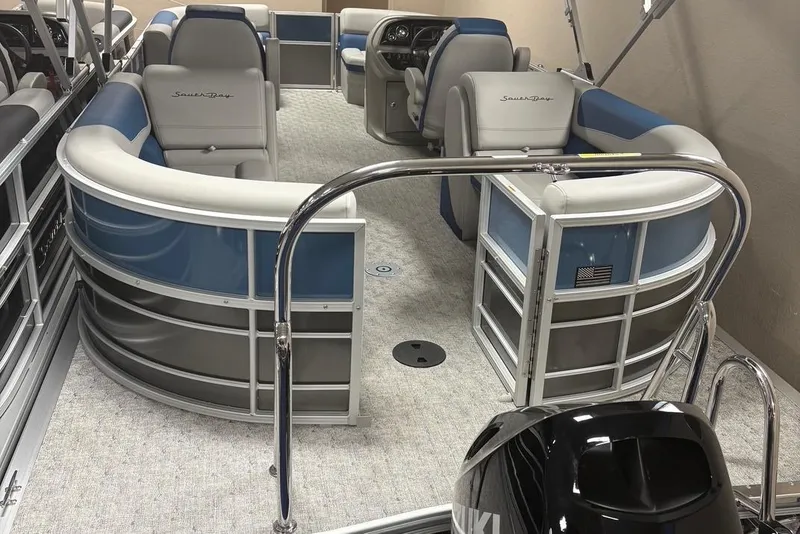Slide: The Image of 2025 South Bay 222 LE pontoon boat interior with plush seating and modern design. - 3