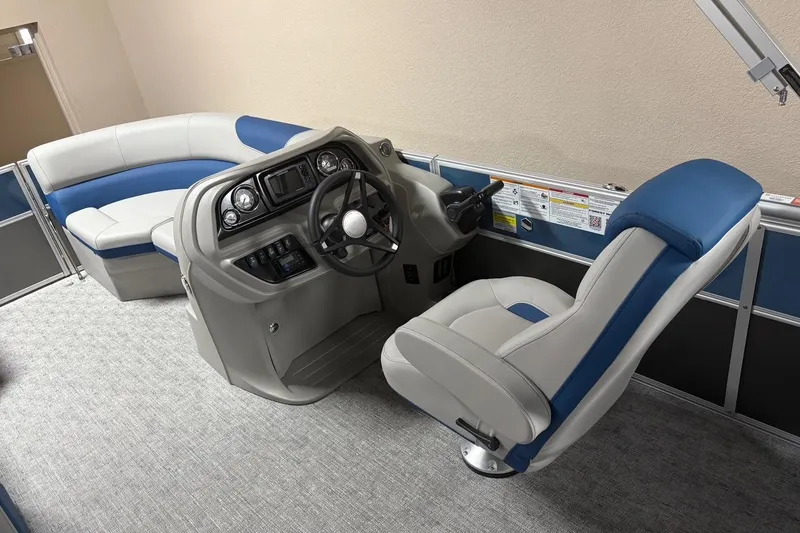 Slide: The Image of Interior of 2025 South Bay 222 LE pontoon boat with modern helm and seating. - 9
