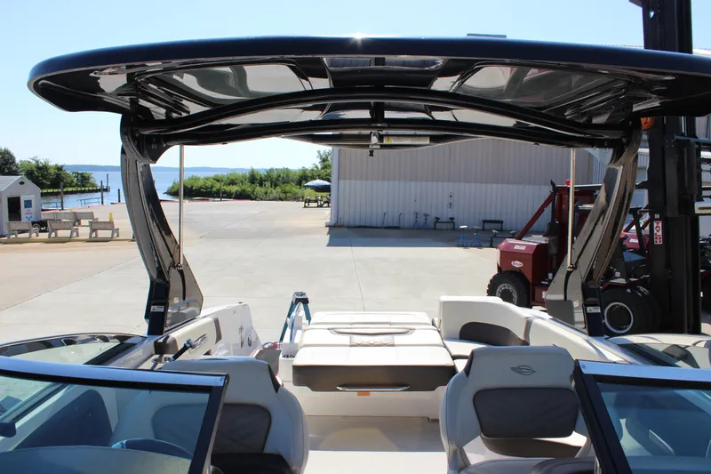 Slide: The Image of 2018 Chaparral 287 SSX boat interior with sleek design and spacious seating. - 13