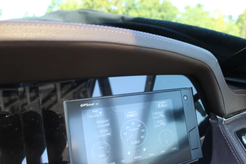 Slide: The Image of Dashboard of 2018 Chaparral 287 SSX boat with GPS display. - 21