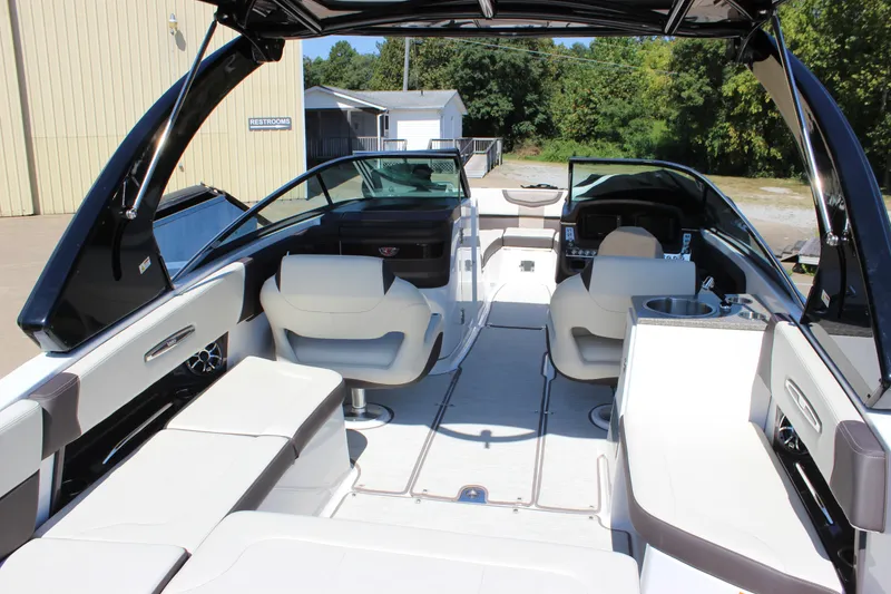 Slide: The Image of 2018 Chaparral 287 SSX boat interior with luxurious seating and modern design. - 29