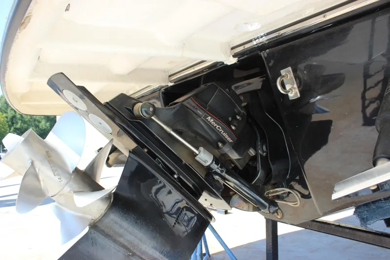 Slide: The Image of Close-up of 2018 Chaparral 287 SSX boat's MerCruiser engine and propeller system. - 39