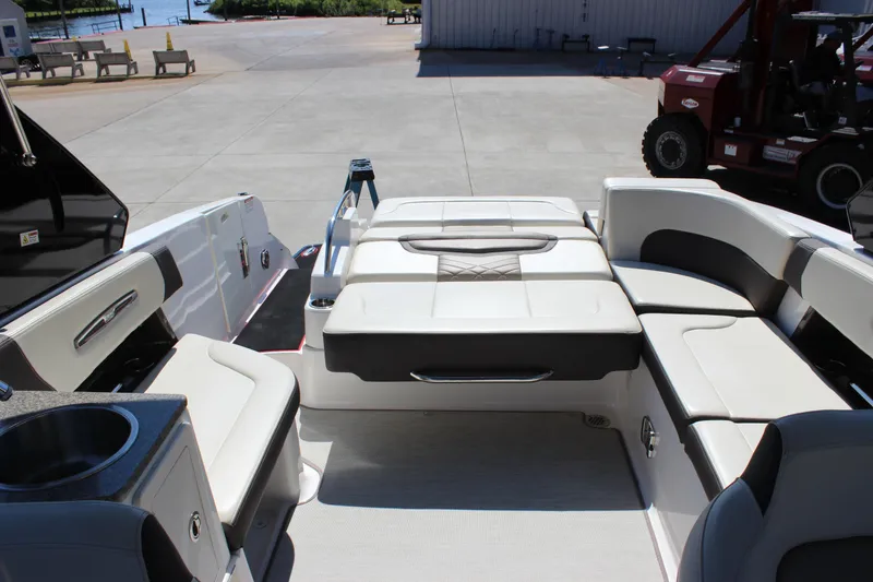 Slide: The Image of 2018 Chaparral 287 SSX boat interior with spacious seating and sleek design. - 6