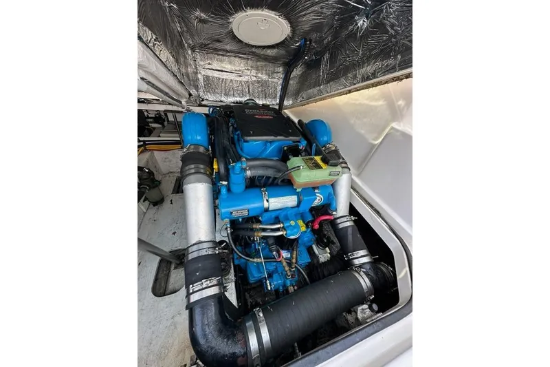 Slide: The Image of Engine compartment of a 2006 Tiara Yachts 2900 Coronet, showcasing detailed components. - 18