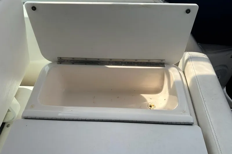 Slide: The Image of Open storage compartment on 2006 Tiara Yachts 2900 Coronet boat. - 21