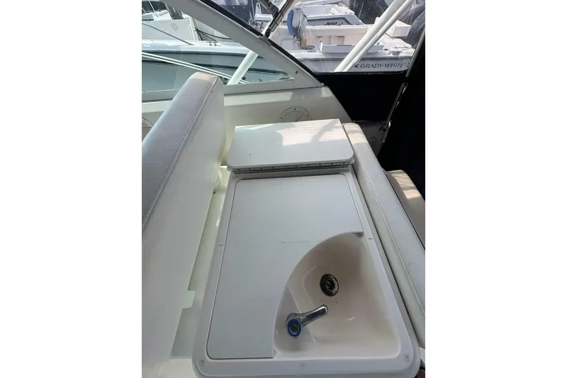 Slide: The Image of 2006 Tiara Yachts 2900 Coronet interior with sink and seating area. - 22
