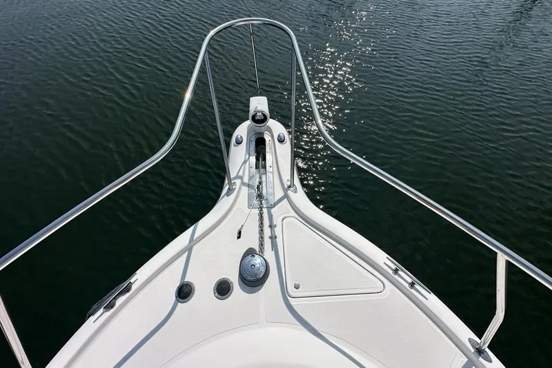 Slide: The Image of Bow view of 2006 Tiara Yachts 2900 Coronet on calm water. - 24