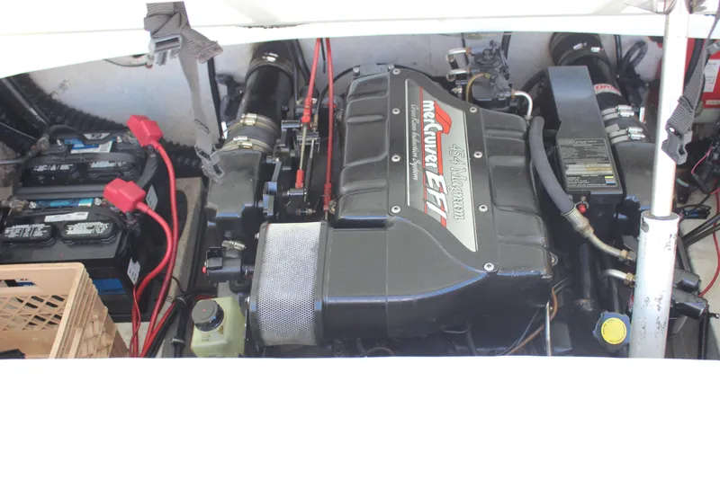 Slide: The Image of Engine compartment of a 1995 Baja 272 boat with MerCruiser EFI system. - 22