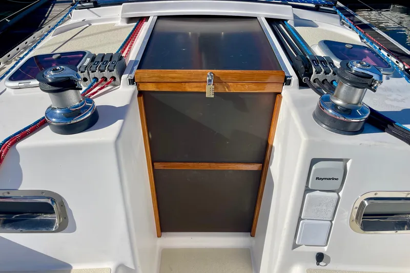 Slide: The Image of Cockpit of 1995 Freedom 35 sailboat with winches and Raymarine equipment. - 12