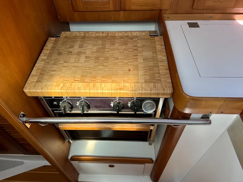 Slide: The Image of Galley area in a 1995 Freedom 35 yacht. - 16