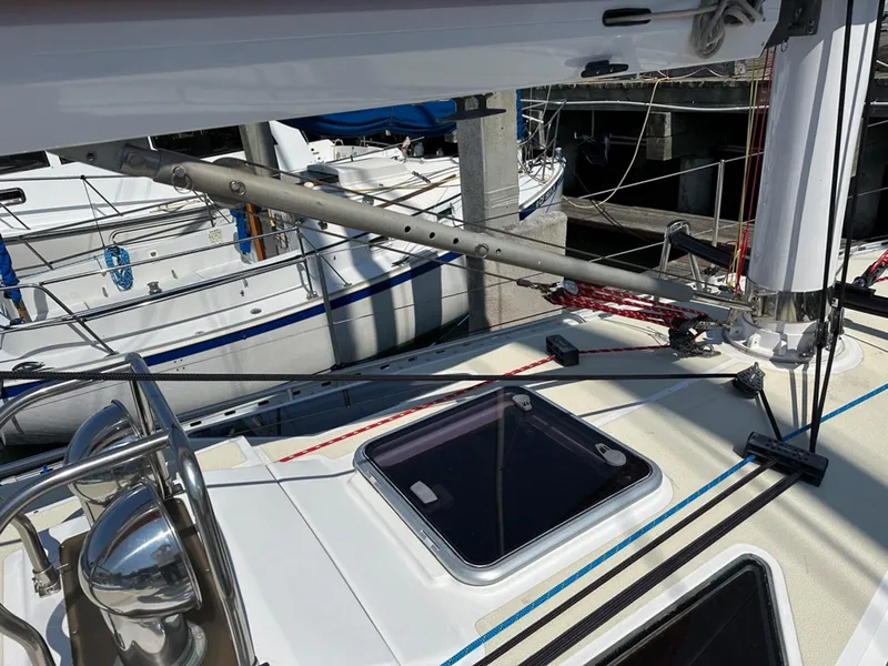 Slide: The Image of Deck of a 1995 Freedom 35 sailboat in harbor. - 39